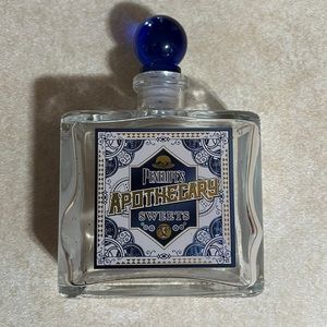Penelope’s Apothecary empty Glass bottle with Cobalt Blue stopper.
